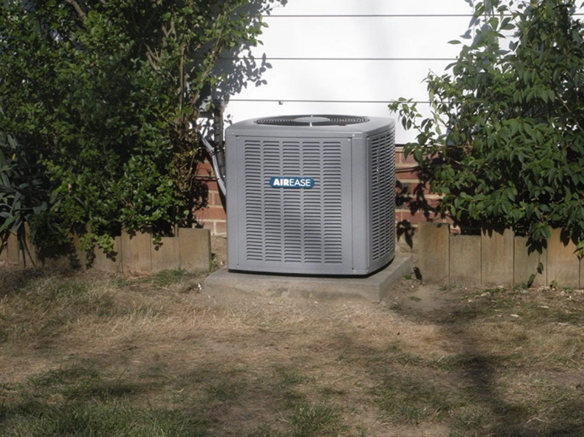 An air conditioning condenser A picture of a newly installed air conditioning condenser