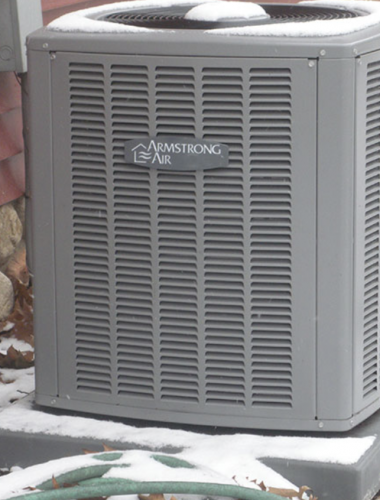 A picture of a newly installed air conditioning condenser